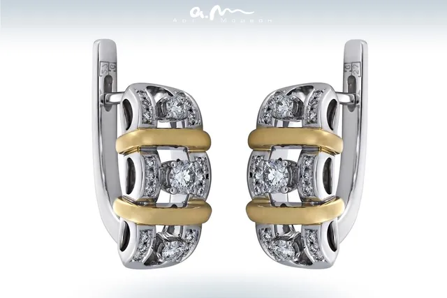 Серьги из золота 750 с бриллиантом